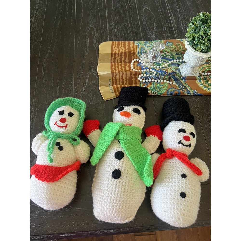 Three handmade crocheted snowman